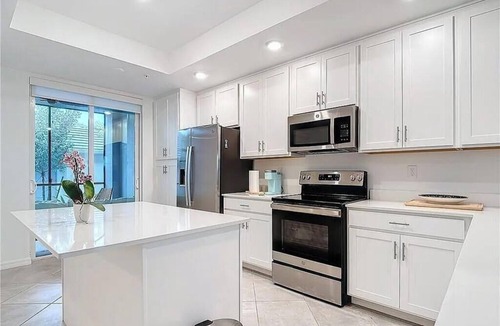 Immokalee Condo | Luxury Golf Condo 2BR + Den Golf & Water Views the National at Ave Maria
