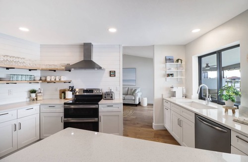 Eight Lakes House | Luxury Gulf-Access Lakefront Retreat | Heated Pool, Spa, Bikes, Kayaks & Dock