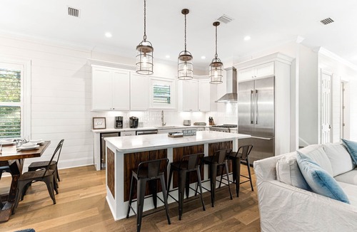 White's Gulfview House | Luxury retreat with screened pool, outdoor kitchen & dining, and coastal charm