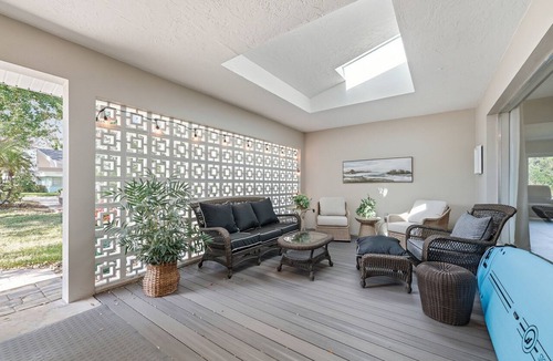 Cocoa Isles House | Luxury Waterfront Retreat Bikes, Hot Tub, Kayak, Walk to downtown Cocoa Beach.