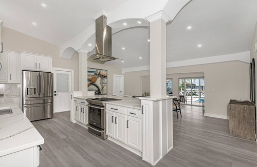 Snug Harbor House | Luxury Waterfront Retreat, Htd Pool, 5Min to Bch, Game Room, Hot tub, Pet