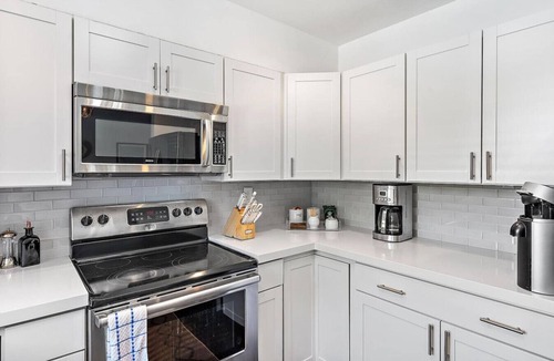 Southside House | Luxury WPB Retreat - Heated Pool & Games