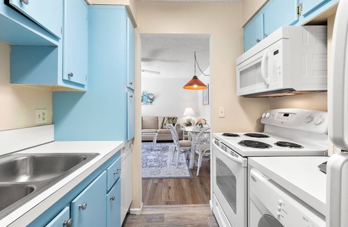 Madeira Beach Condo | Madeira Beach Yacht Club 151H | Balcony, Pool + Hot Tub Access