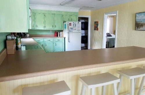 Gulf Shores Cottage | Minutes from beach with Bay view, pier, fenced yard & dog friendly!