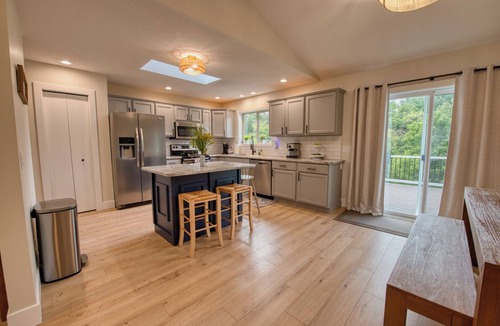 Apple River House | Modern Lake Retreat with Hot Tub, Game Room & Two-Tier Deck