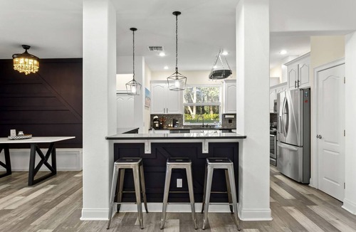 Port Richey House | Modern Spacious Getaway: Heated Pool, Movie Room, Huge Yard & Event-Friendly in New Port Richey, Florida