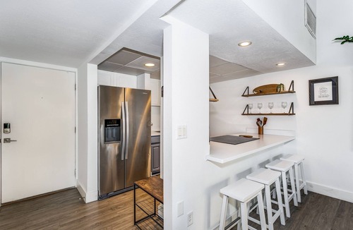 Villa Sabine Condo | New! Centrally located 1 bed 1.5 bath with water views!