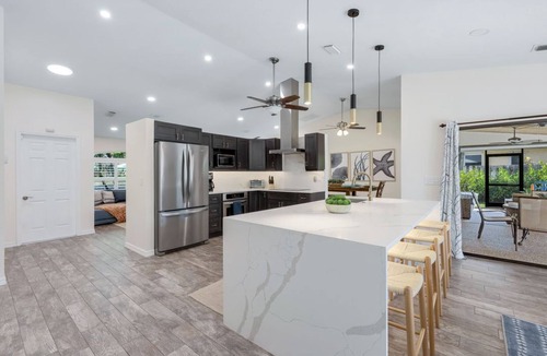 Willoughby Acres House | North Naples oasis near Mercato and beaches with screened private pool & hot tub