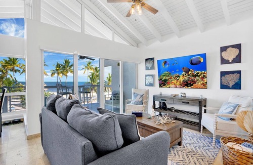 Rock Harbor House | Ocean Front Villa with endless Views, golf cart, paddle boards, kayak and bikes