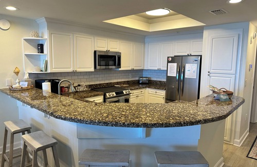 Panama City Beach Condo | PARADISE AWAITS! Enjoy the melody of waves and panoramic views from your balcony