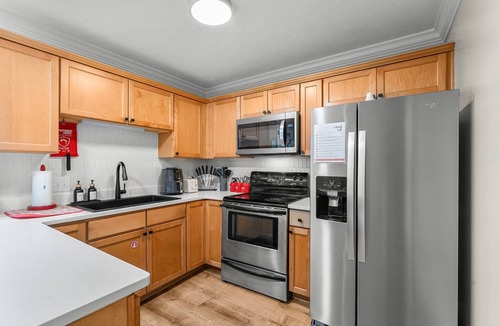Lower Grand Lagoon House | PCB Sleeps 22 2 Homes 2 Pools 2 Mini Golf
