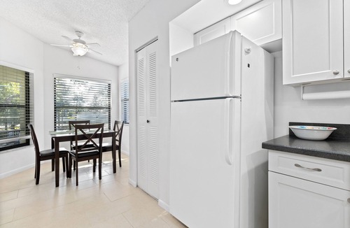 Trailer Estates Condo | Peaceful Lakeview Condo 2 Pools Minutes to IMG & Beaches