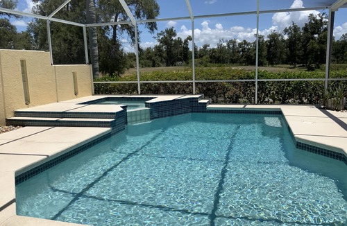 Golf and Sea Village of Apollo Beach House | Pool and heated spa, 3 bedroom, 2 baths, golf, beaches, safe community.