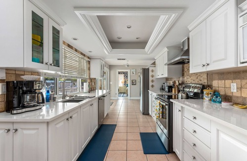 Caloosahatchee House | Poolside Paradise -heated pool, hot tub and game room! Waterfront Canal Views!