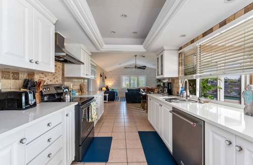 Caloosahatchee House | Poolside Paradise -heated pool, hot tub and game room! Waterfront Canal Views!