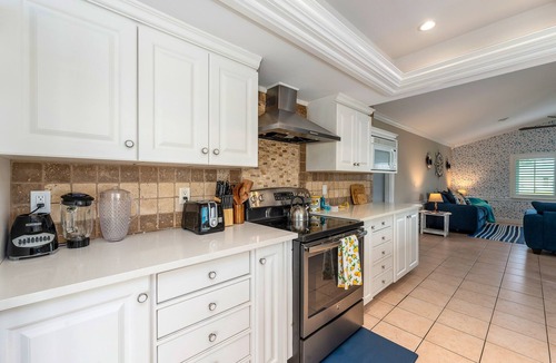 Caloosahatchee House | Poolside Paradise -heated pool, hot tub and game room! Waterfront Canal Views!