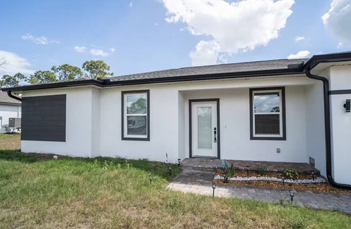Gulf Cove House | Port Charlotte Getaway 4BR Sleeps 8 BBQ Near Englewood Beach