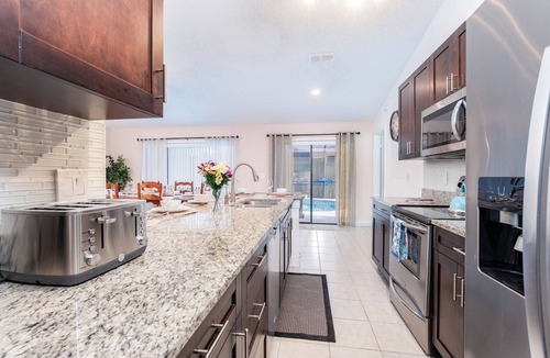 Brandon House | Private Pool Retreat Near Tampa with Hot Tub Game Room Sleeps 12
