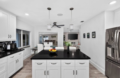 Bel Air House | Private Pool + Tiki Lounge + Al Fresco Dining | Canal Front | Coral Current