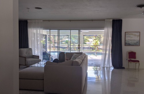 Central Beach House | Private, quiet Midcentury Pool Home in Central Beach, four blocks to sand