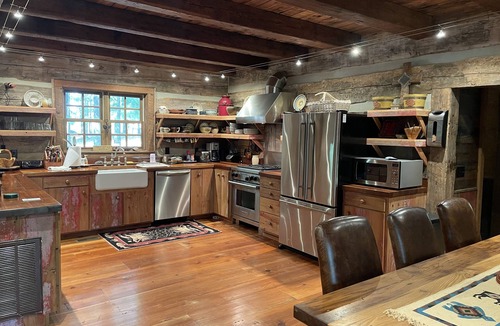 Hanceville Cabin | Prospect Mountain Cabin custom log home sportsman's paradise with fishing lake.