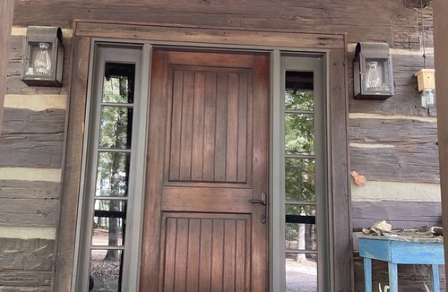 Hanceville Cabin | Prospect Mountain Cabin custom log home sportsman's paradise with fishing lake.