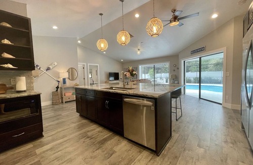 Willoughby Acres House | Quiet Luxury Coastal Naples Retreat Heated Pool + Designer Outdoor Living