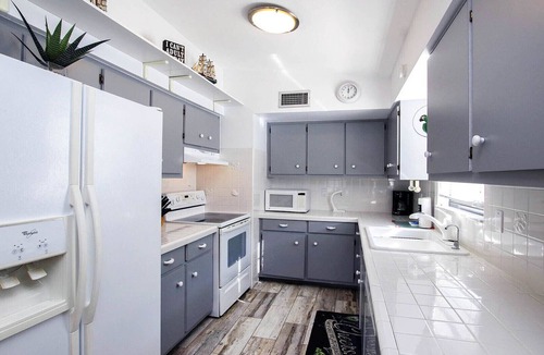 Mid Island House | Rare Find! Sea Breeze Gulf Home. Heated Pool, steps to the Beach.