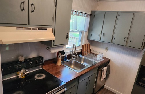 The Village of West Clay House | Recently remodeled 3 bed, 1.5 bath home on a beautiful lot w 3 ponds & creek