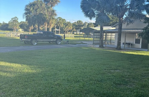 Palm City Cabin | Relax by the fire at The Smoke House cottage at the Ryan Holmes Ranch!