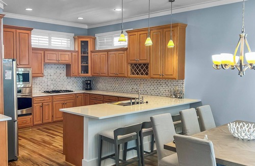 Village of Sugar Beach House | Remodeled 5 bedroom house with bikes – walking distance to the beach