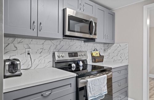 Aloha Gardens House | Remodeled Lake Front Pool Home! Sleeps 13! Bring dogs and kids!