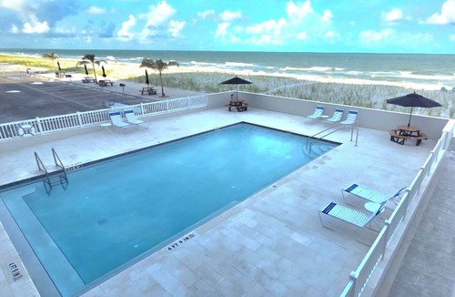 Sunset Beach Condo | Right on the Gulf! Beautiful white sandy beachfront! Safe, quiet, and friendly!