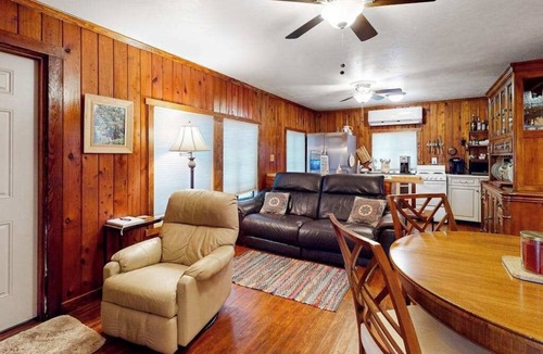 Bonita Springs House | Riverfront dog-friendly cottages with kayaks, dock, patio, grill, & water views