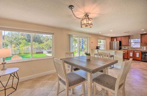 New Port Richey Cottage | Riverfront Home w/Putting Green & Boat Dock!