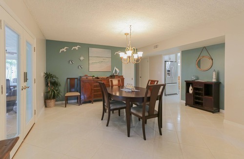 Sebastian House | Riverfront Retreat, Private Docks, on Small Acreage.