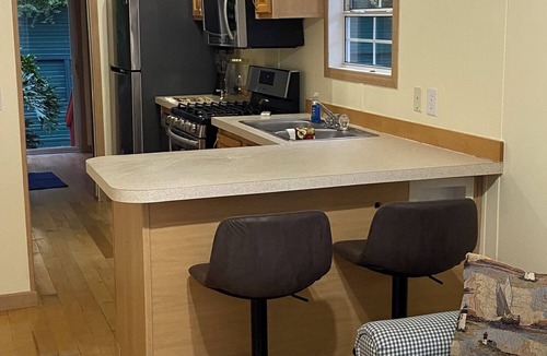 Milton RV Rental | ROOMY PARK MODEL HOME WITH PRIVATE BEDROOM WITH QUEEN SIZE BED, FULL KITCHEN AND BATHROOM, LIVING ROOM WITH PULL-OUT QUEEN-SIZE BED IN COUCH. HAS COVERED PARKING & A DECK, WITH SHED. MONTHLY RATE IS $1,400, BUT PLEASE CALL FOR AVAILABILITY.