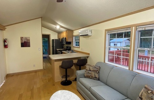 Milton RV Rental | ROOMY PARK MODEL HOME WITH PRIVATE BEDROOM WITH QUEEN SIZE BED, FULL KITCHEN AND BATHROOM, LIVING ROOM WITH PULL-OUT QUEEN-SIZE BED IN COUCH. HAS COVERED PARKING & A DECK, WITH SHED. MONTHLY RATE IS $1,400, BUT PLEASE CALL FOR AVAILABILITY.