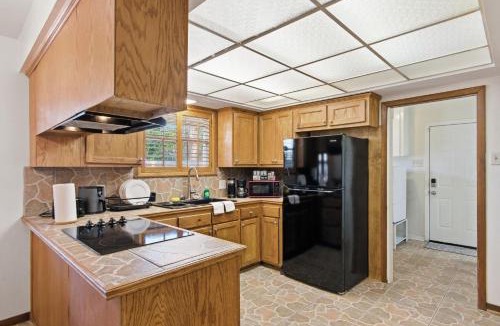 Broadmoor House | Rustic Retreat 5-BR Home with Backyard Oasis