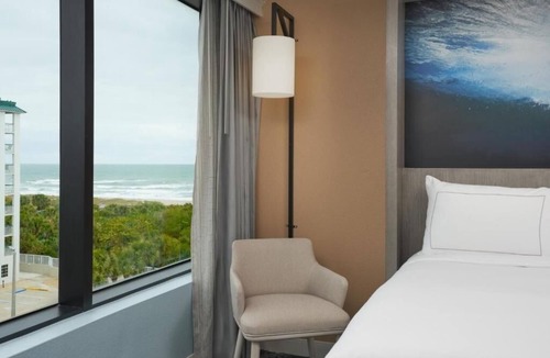 Cocoa Beach Hotel | Seaside Symphony | Heated Pool + Beach Bar | 1.7 mi to Alan Shepard Beach Park
