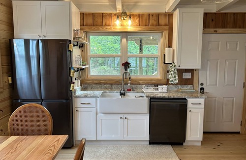 Fairhope Cabin | Secluded waterfront fishing cabin, boat dock, pier, sunsets, boat to beach