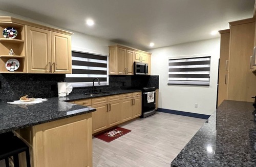 Ludlam Villa | Shared heated pool, ping-pong and BBQ