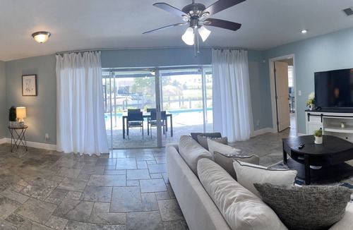 Pelican House | Short Distance From Tarpon Point Marina! Gulf Access, Heated Pool, Dock & Tiki!