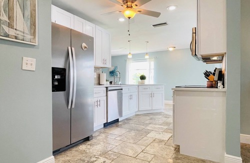 Pelican House | Short Distance From Tarpon Point Marina! Gulf Access, Heated Pool, Dock & Tiki!