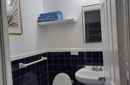 Surfside Apartment | Simply Perfect - Chill in Comfort - Steps to the Beach- Amazing Historic Bldg