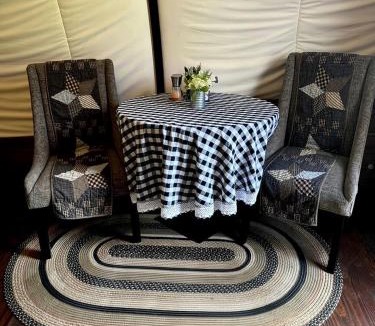 Putnam Hall House | Soulful Glamping Experience with Highland Cows, Private Wagon & Nature in Melrose, Florida