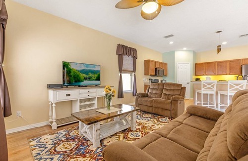 Watersong House | Southfacing heated pool and spa home in Watersong close to Disney attractions