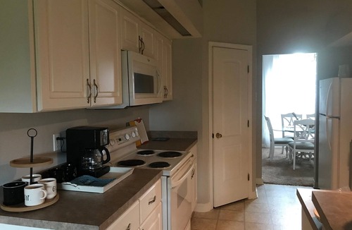 Ono Island House | Spacious 3-bedroom home with fenced backyard in Pensacola's Perdido Key area.