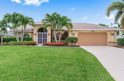 Caloosahatchee House | Spacious 4-bedroom house in charming Cape Coral neighborhood.