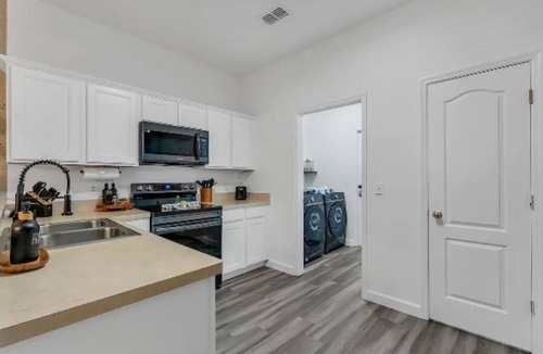 Sandy Ridge House | Spacious 4-bedroom Home in Davenport with Pool Heat Close to Disney!